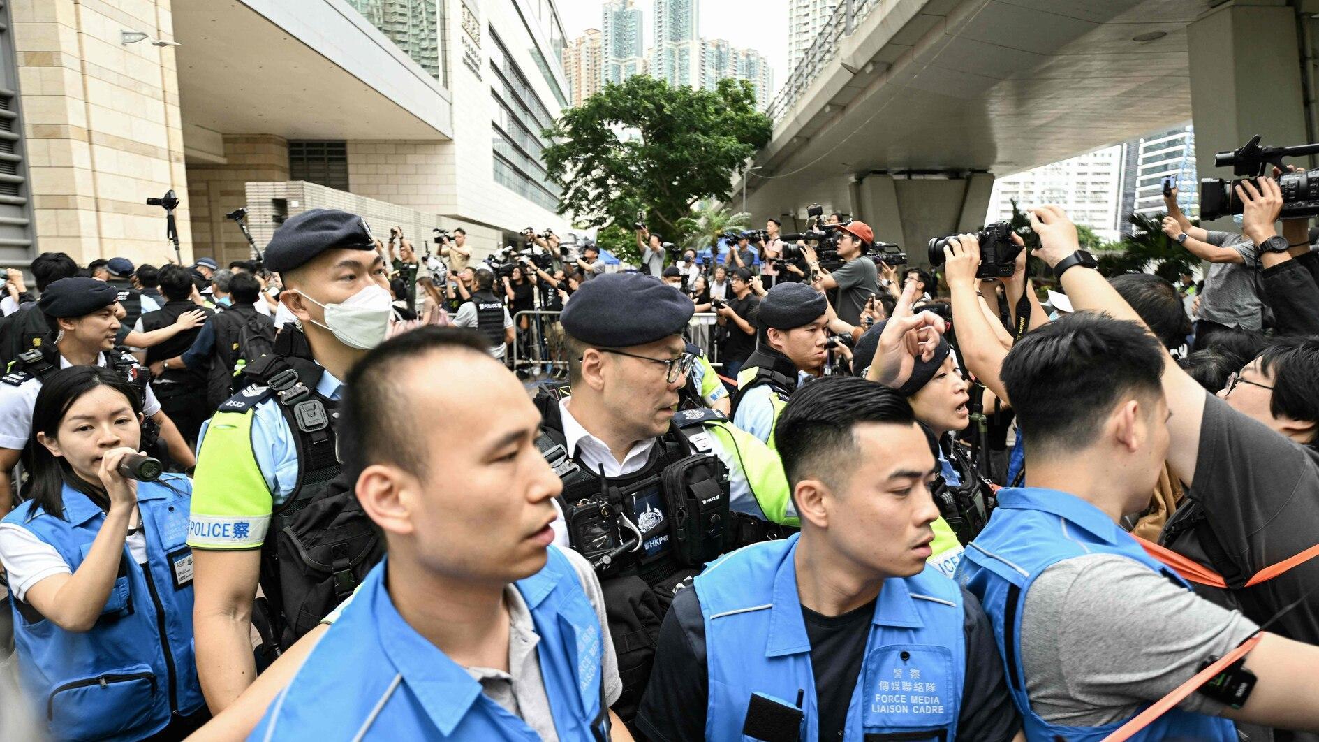 14 Hong Kong democracy campaigners found guilty of subversion