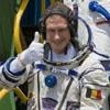 Astronauts blast off to double space crew