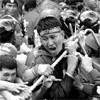 Thai PM defies protests to give first speech
