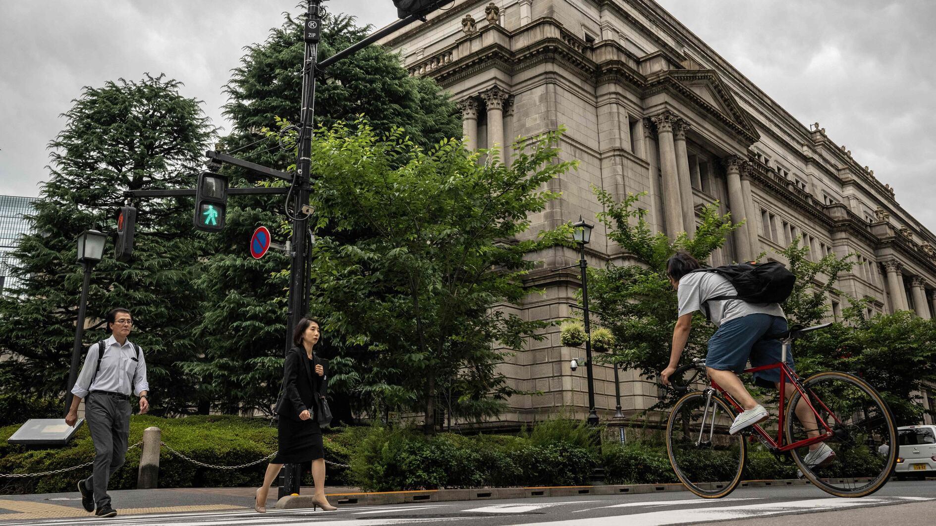 Bank of Japan to scale down huge bond-buying program