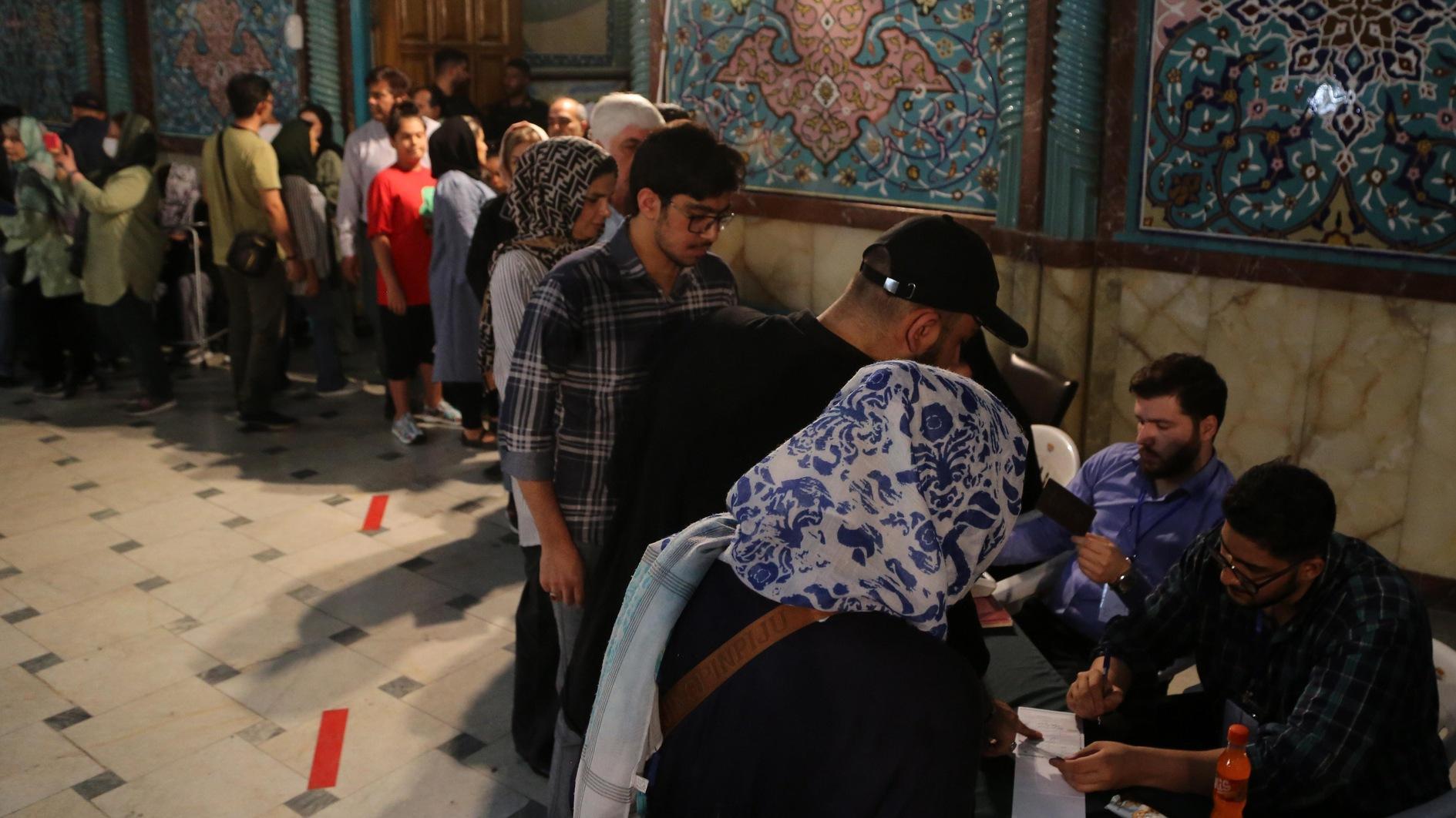 Reformist, ultraconservative qualify for Iran runoff election