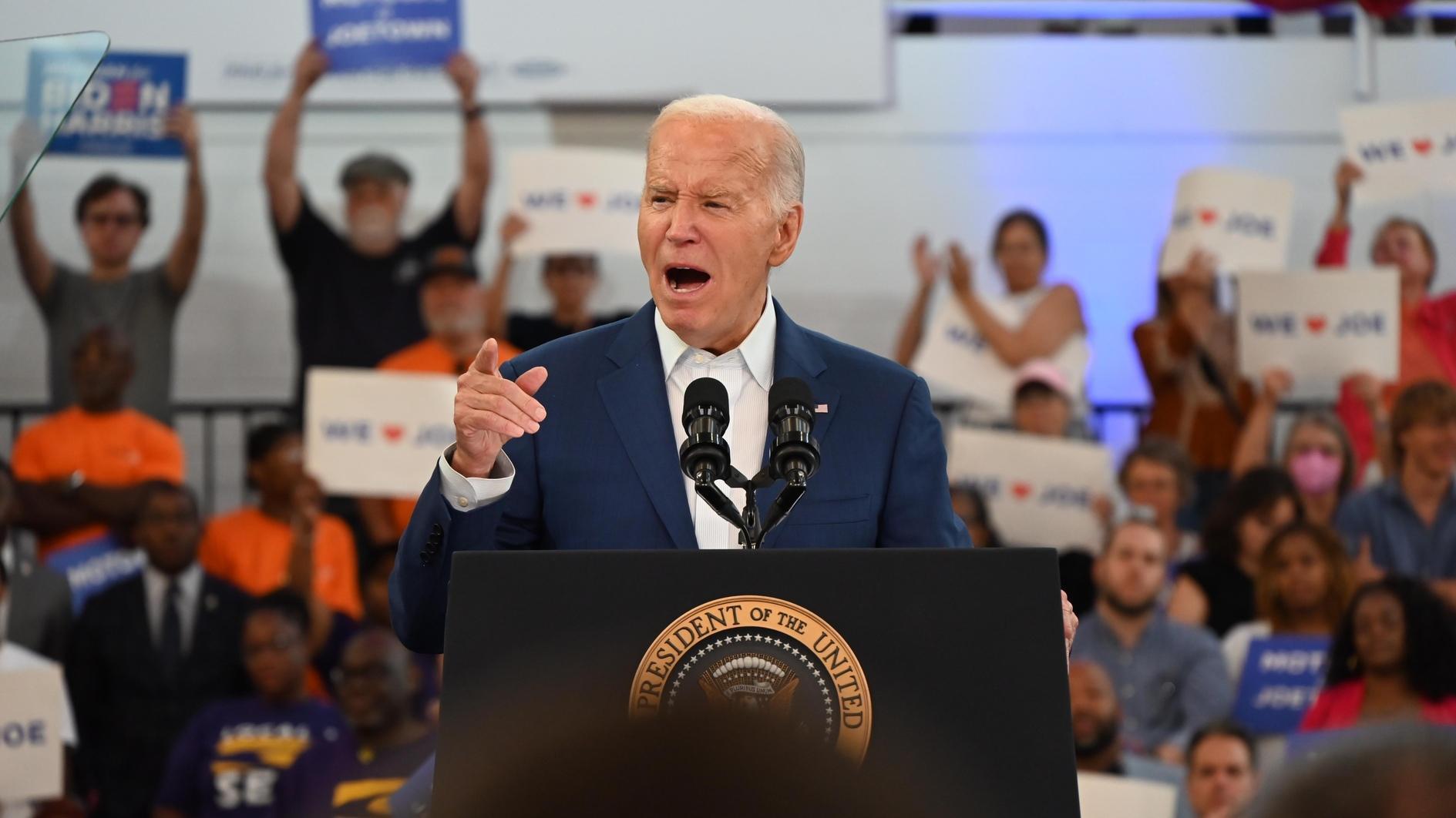Biden defiant on campaign trail but pressure mounts