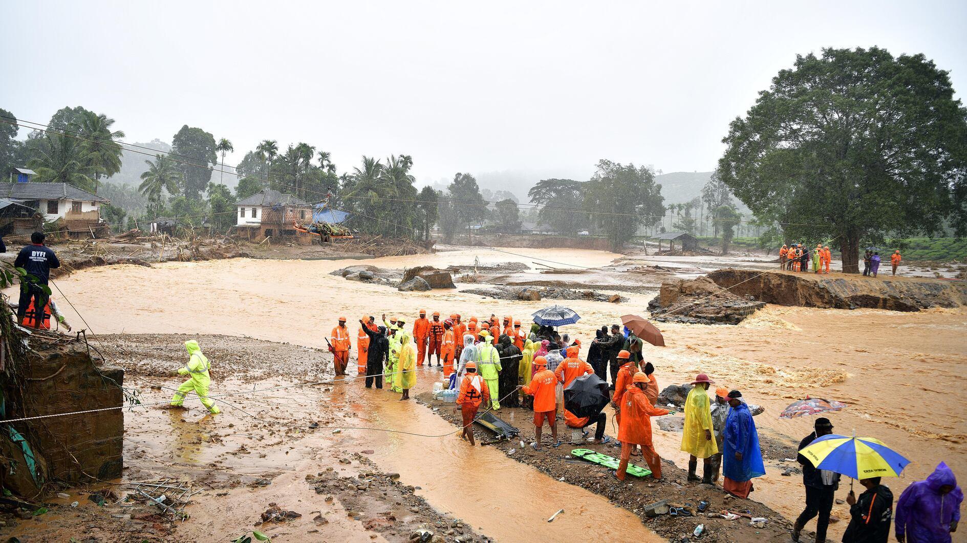 India landslide toll hits 122 as rain hampers rescue work