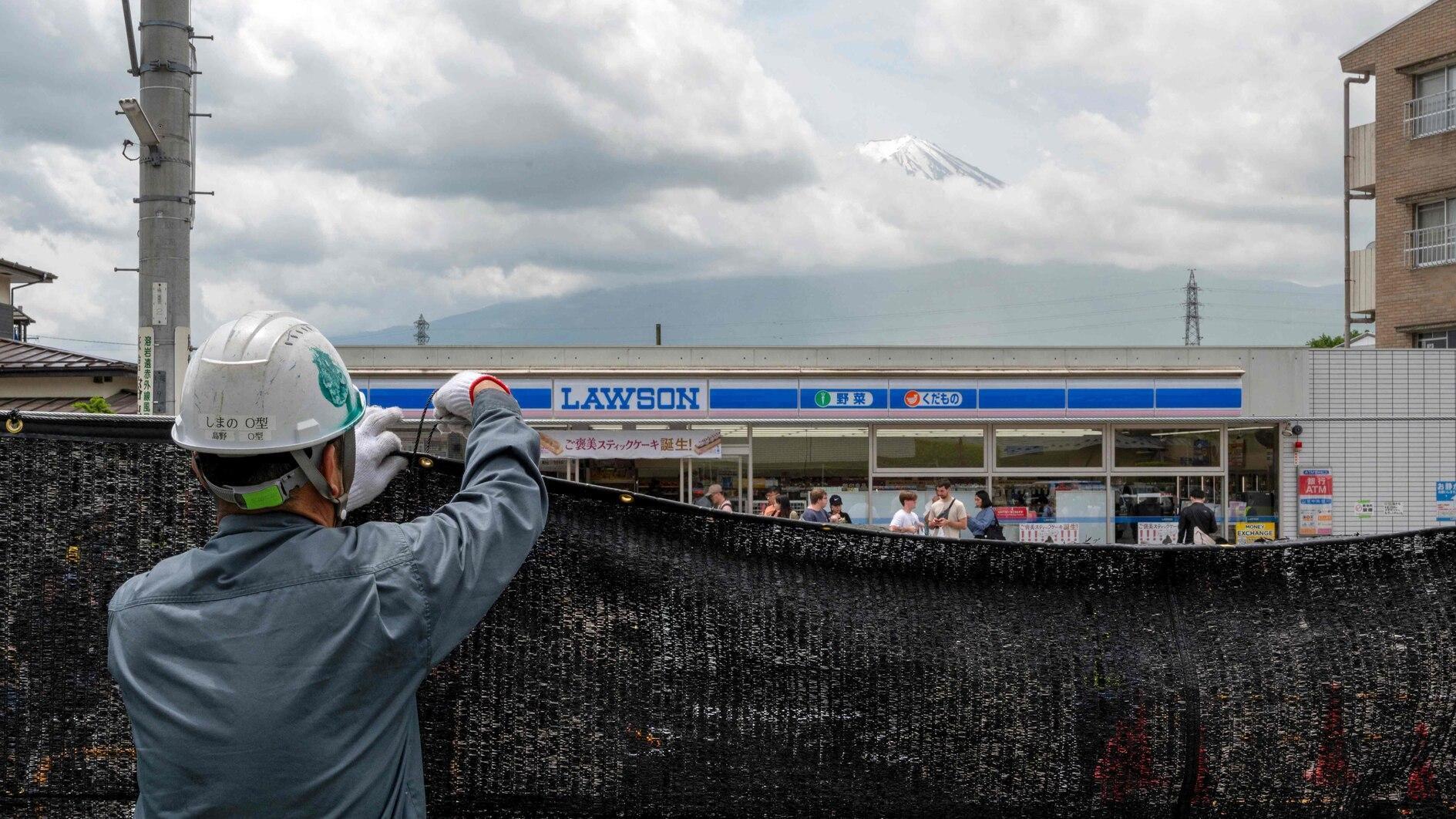 With tourists away, Mount Fuji barrier taken down in Japan