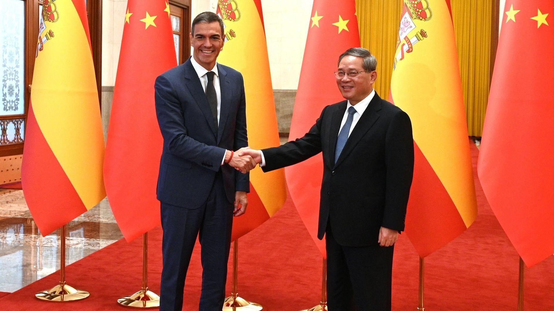 Spains PM meets Xi, pushes fair trade order on China trip