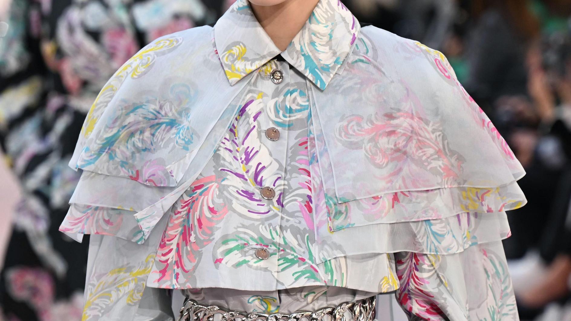 Feathers fly at Chanel as Vuitton packs in stars