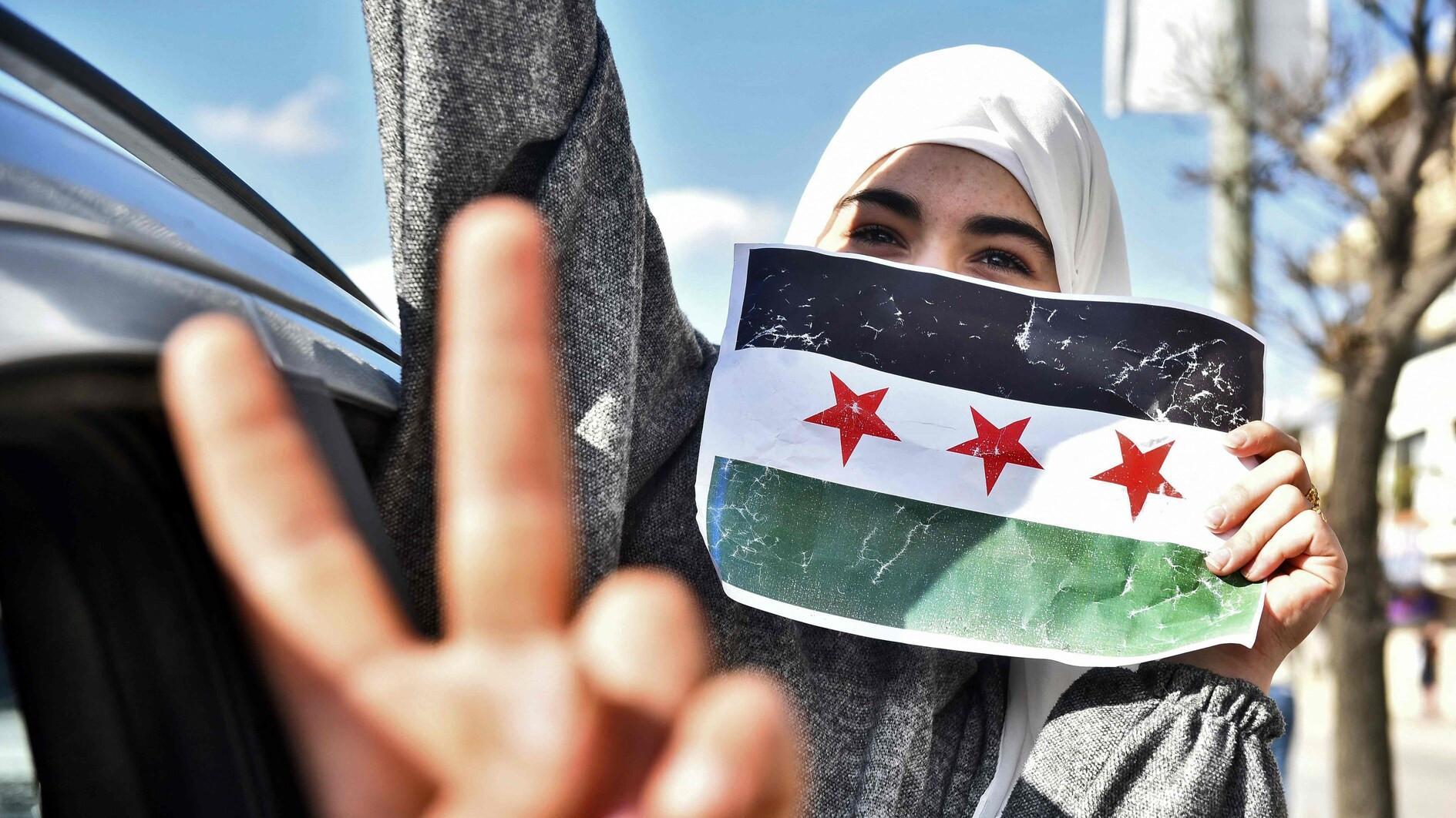 Syrians celebrate Assads fall as his whereabouts unknown
