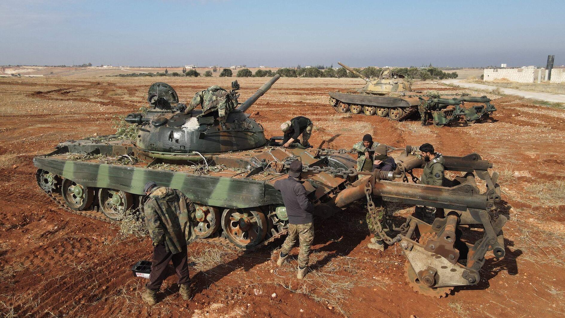 Syria authorities say armed groups have agreed to disband, merge under defense ministry