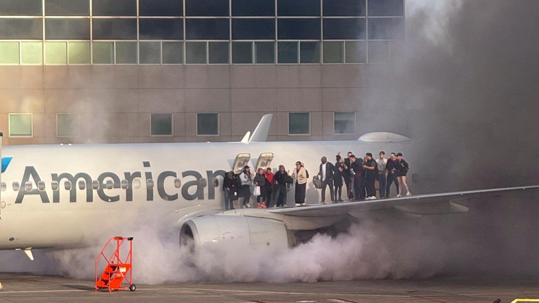 Fire aboard US airliner after diverted to Denver, 12 injured
