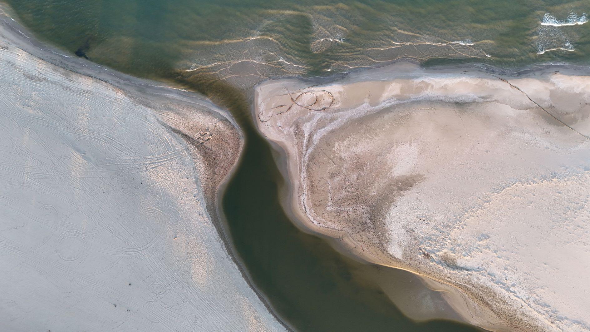 Spring rains unite lake with Black Sea in rare incident
