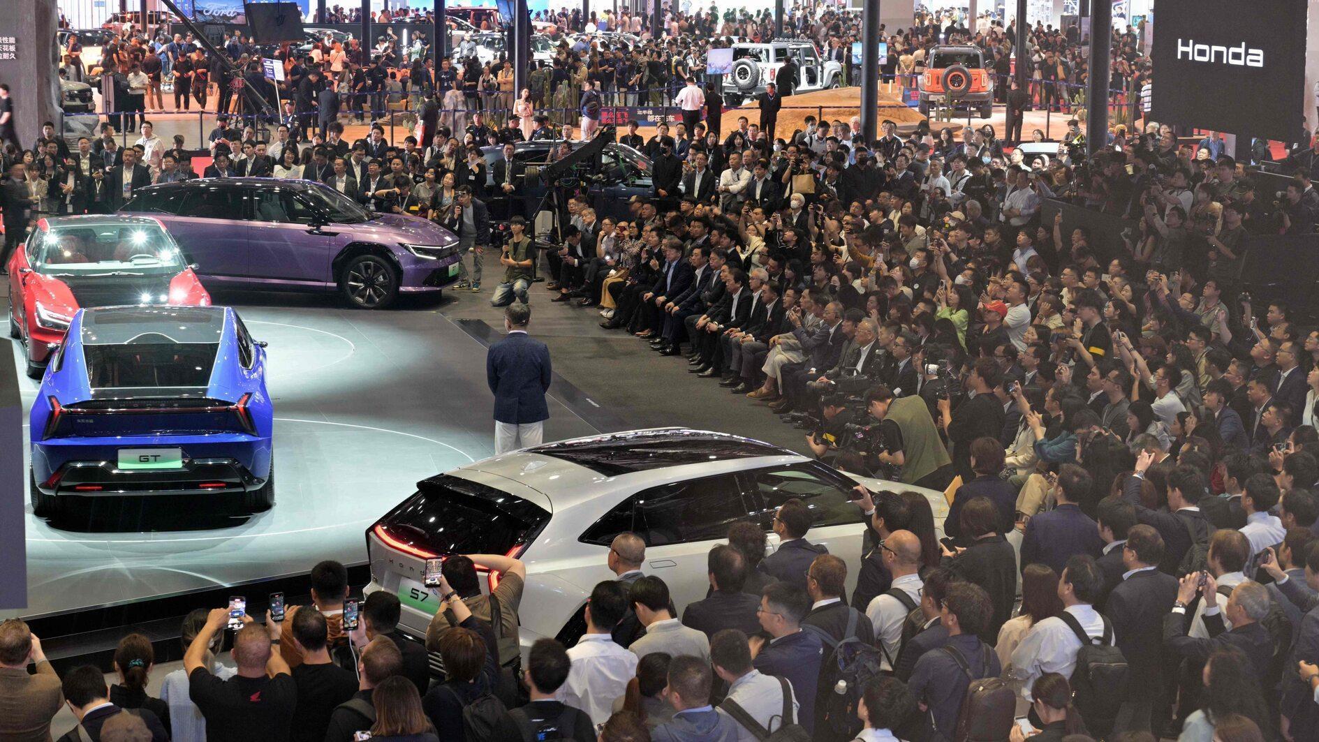 Auto Shanghai showcases new EV era despite tariff speedbumps