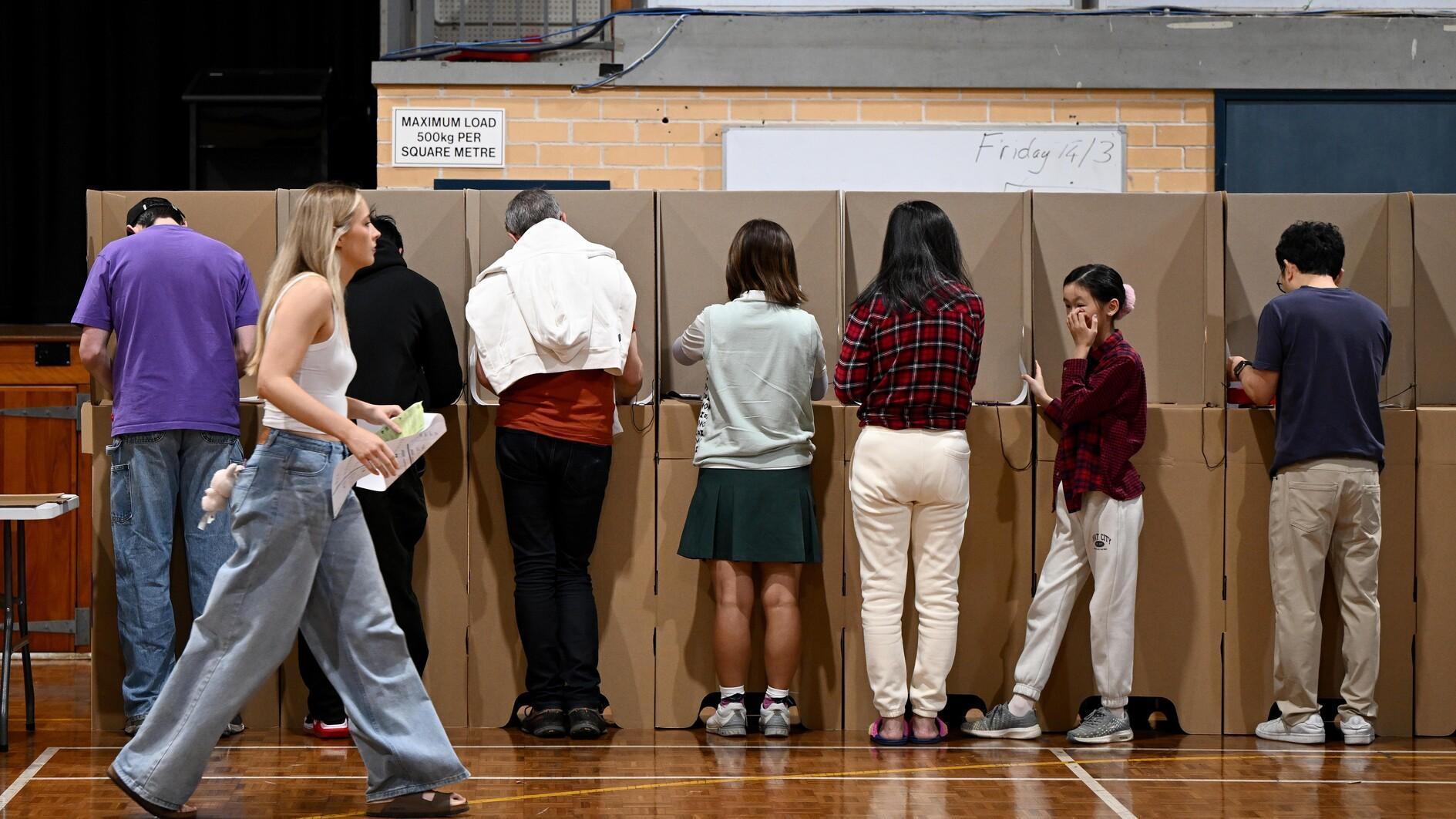 Australians vote in election swayed by inflation, Trump