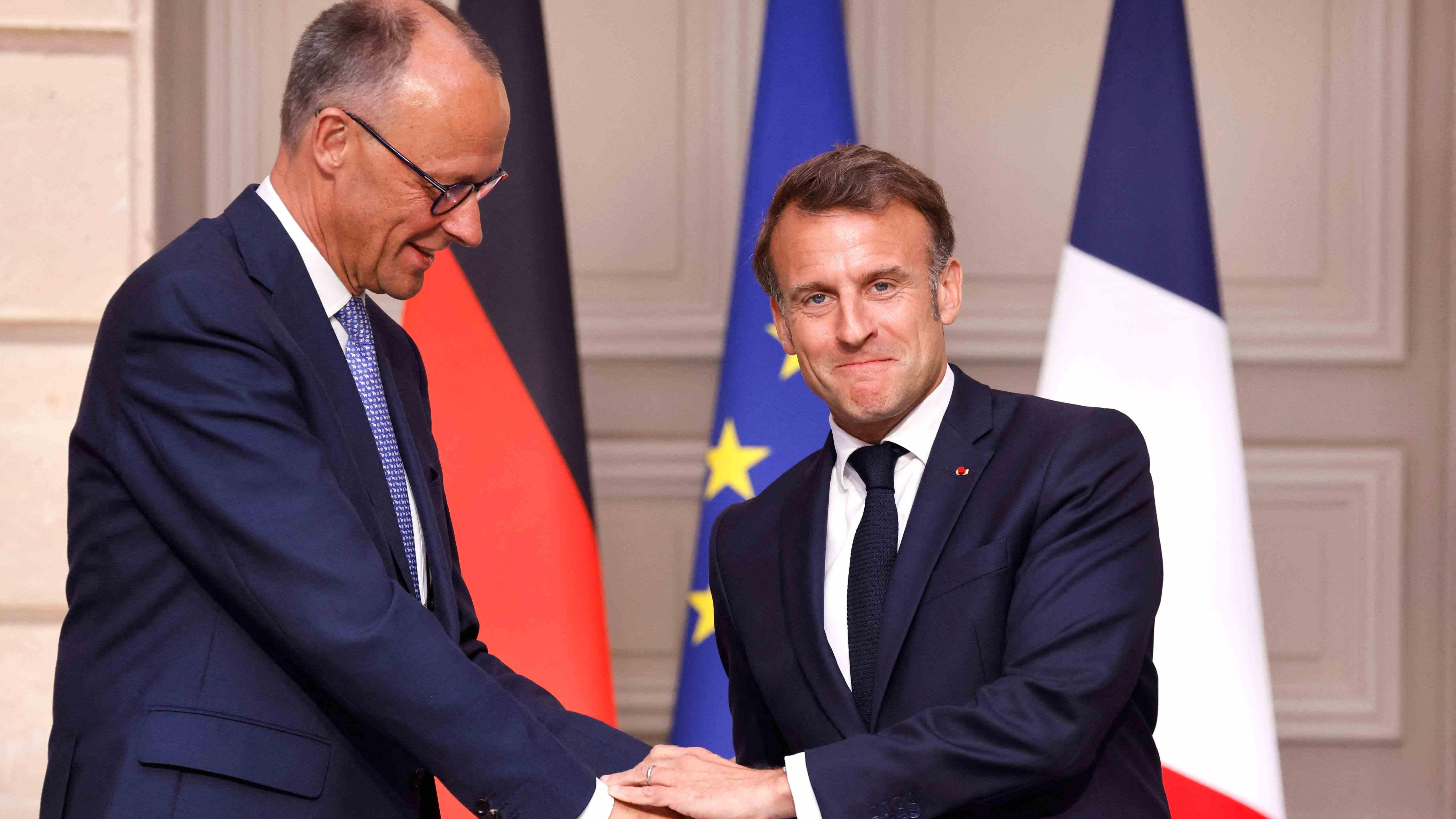 France, Germany say to cooperate more closely on defense