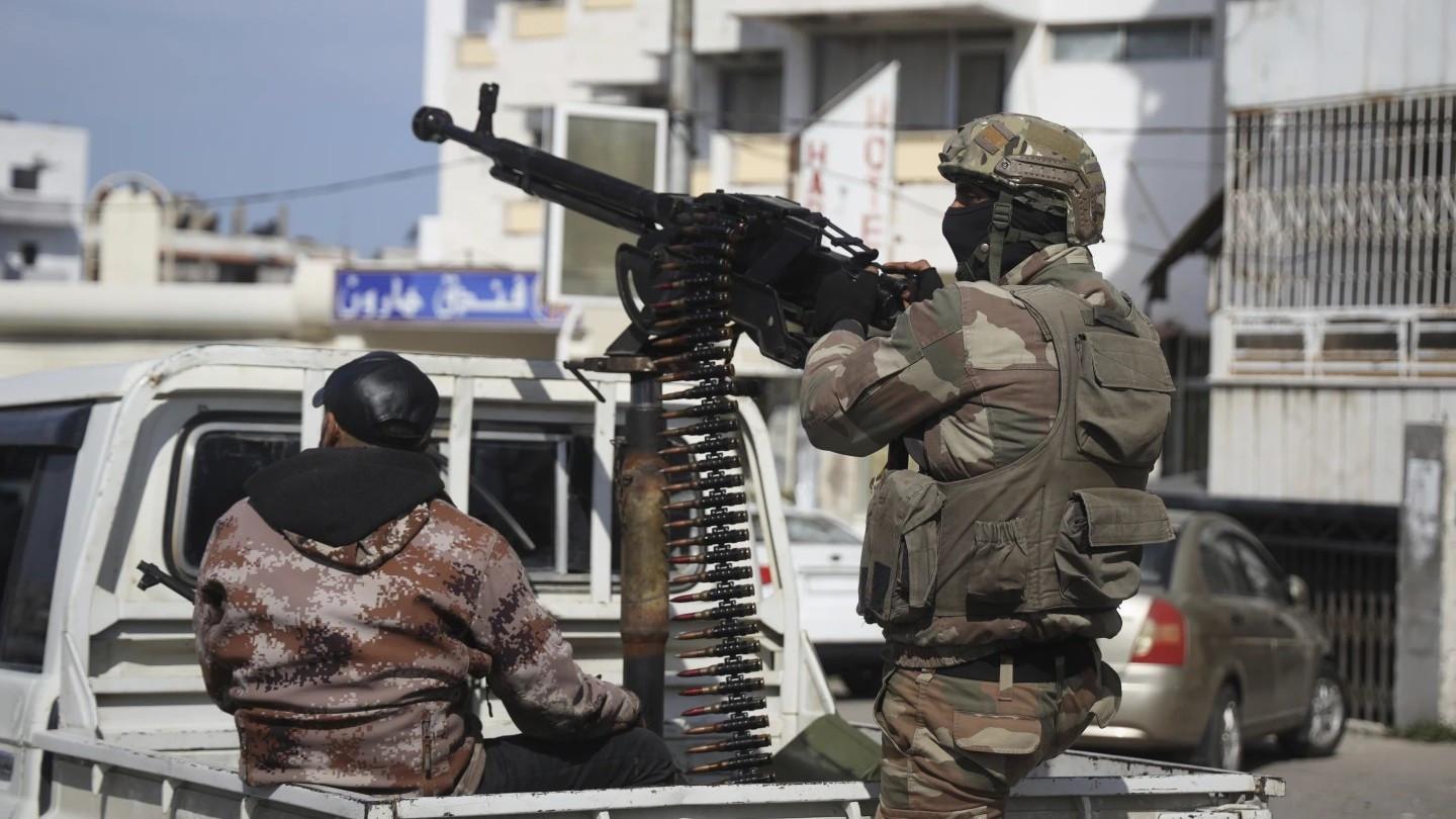 Syria gives holdout armed groups deadline to join state forces