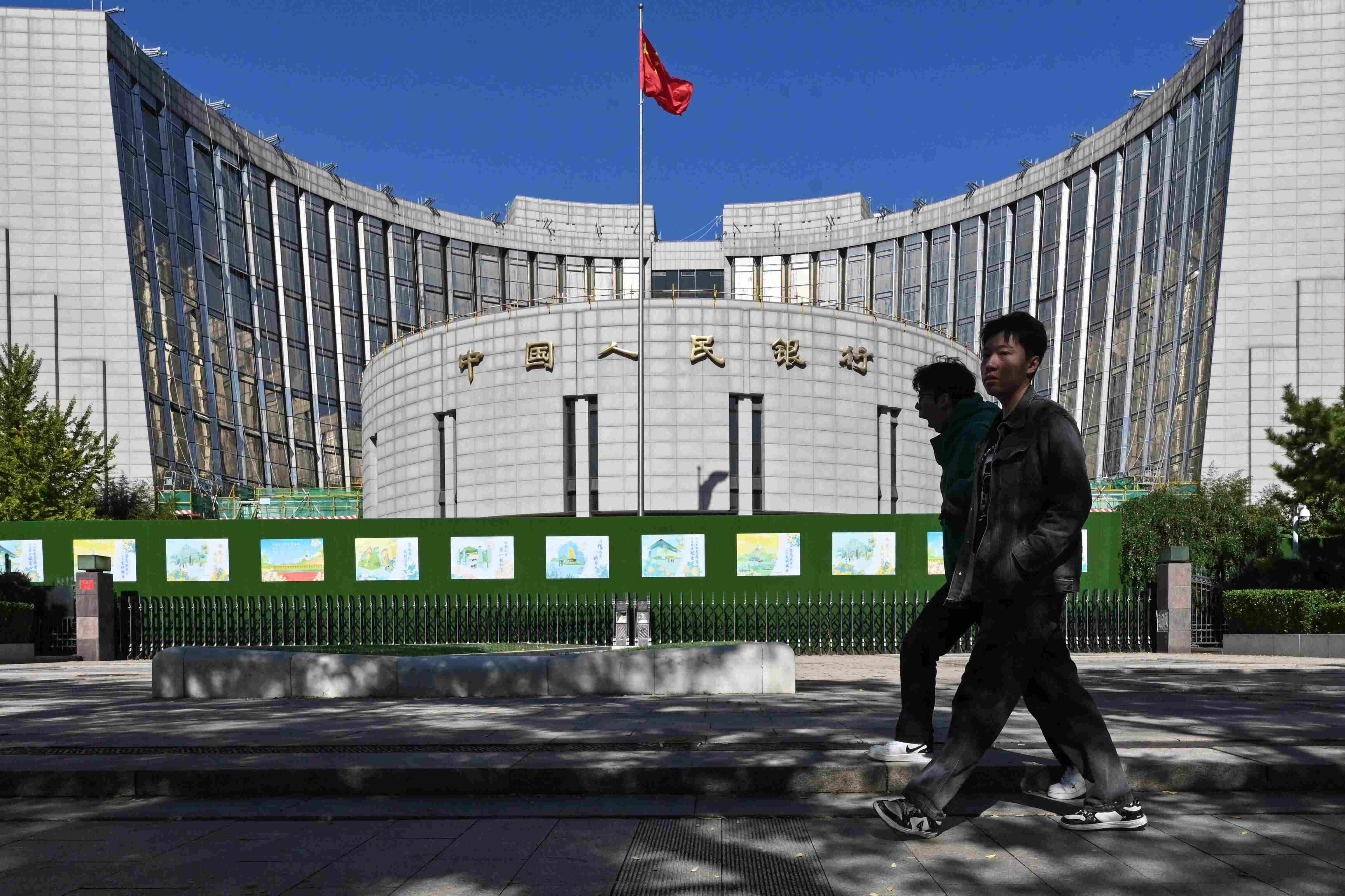 Chinas central bank cuts two key rates to historic lows