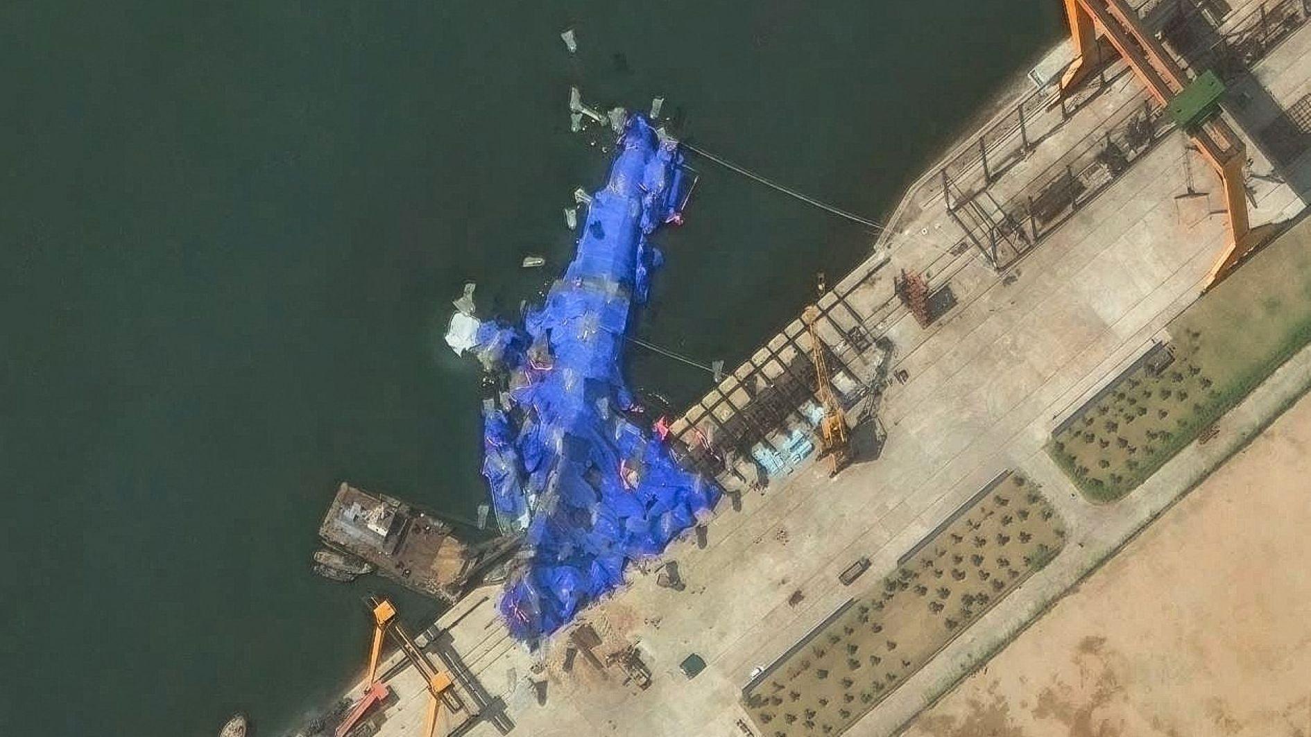 N Korea detains three over warship launch failure