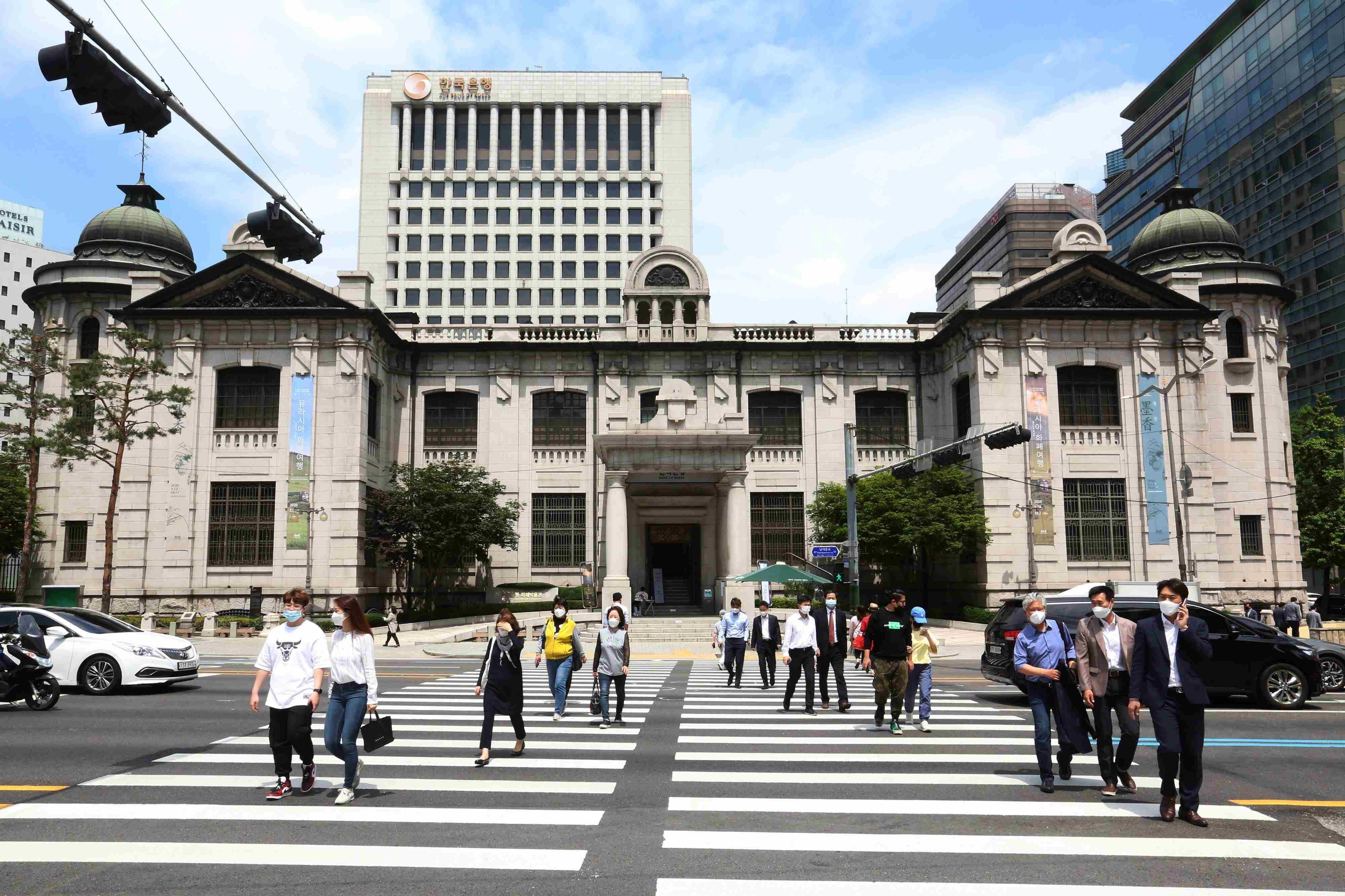 S Korea central bank cuts rate, slashes 2025 growth forecast