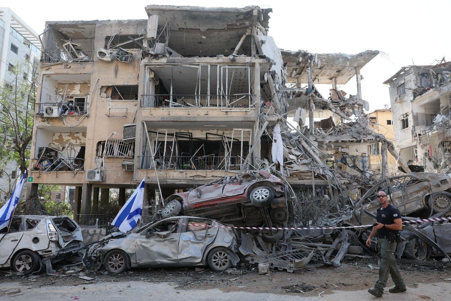 Israel threatens Tehran will burn after wave of missile fire