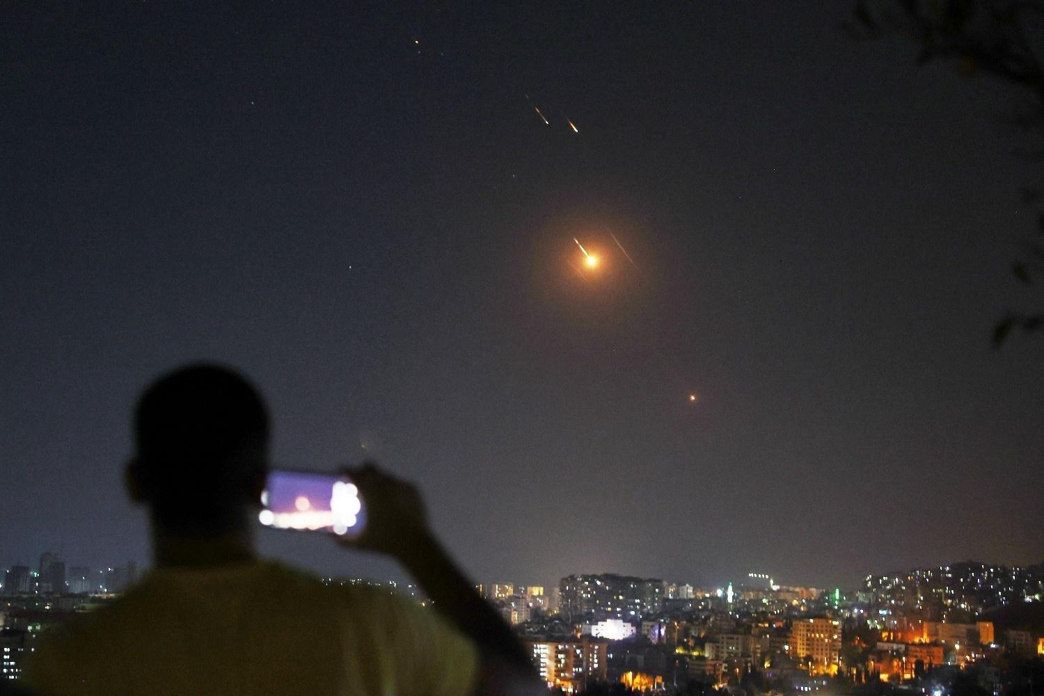 War-weary neighbors watch conlict from sidelines