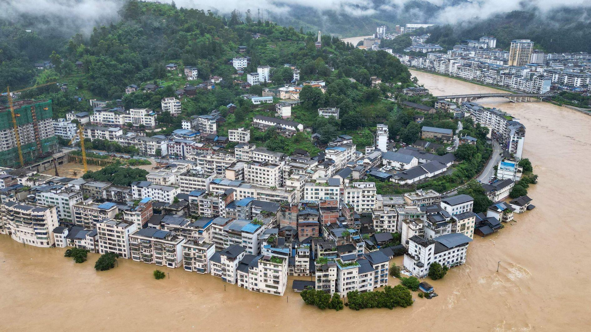 Over 80,000 people flee severe flooding in China
