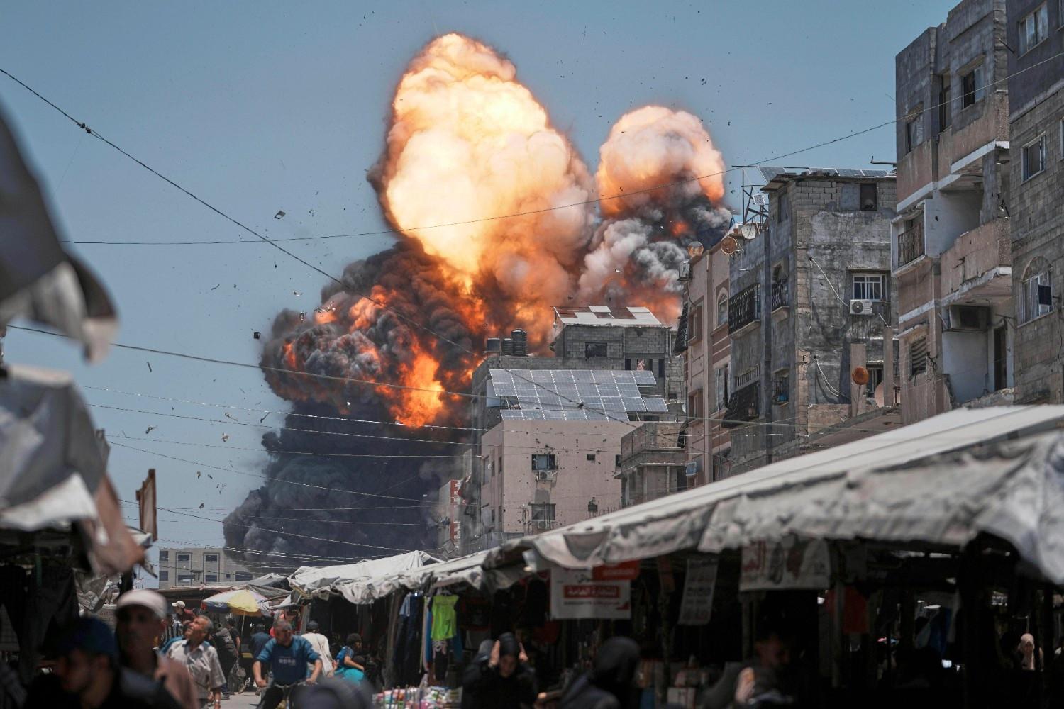Gaza rescuers say Israeli forces kill over 50 as ceasefire calls mount