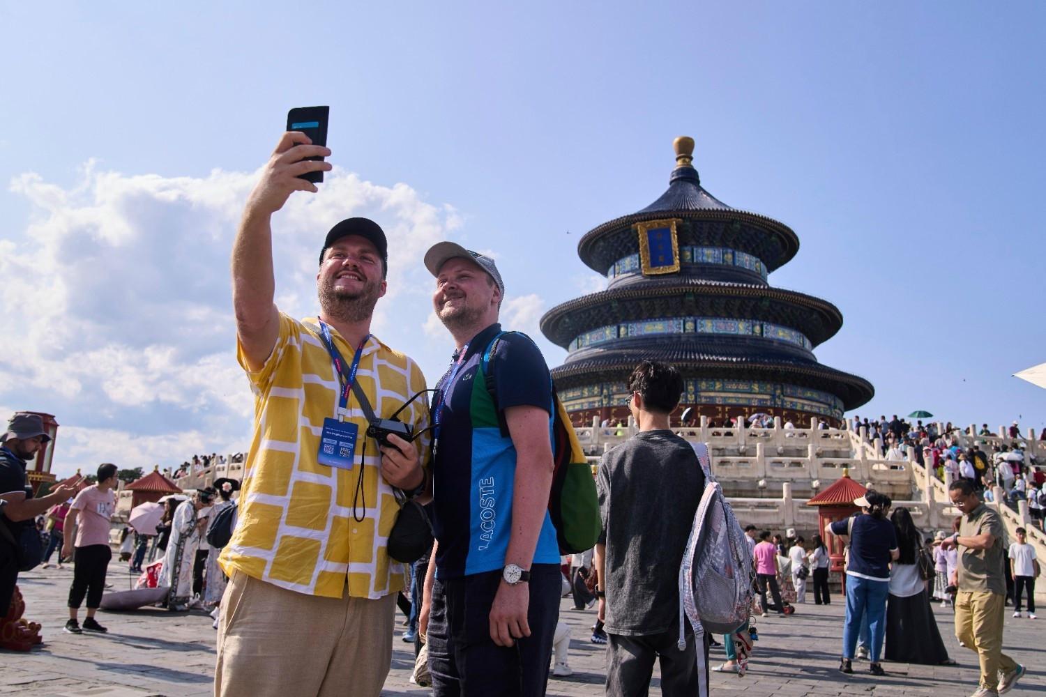 China extends visa-free entry to over 70 countries to draw tourists