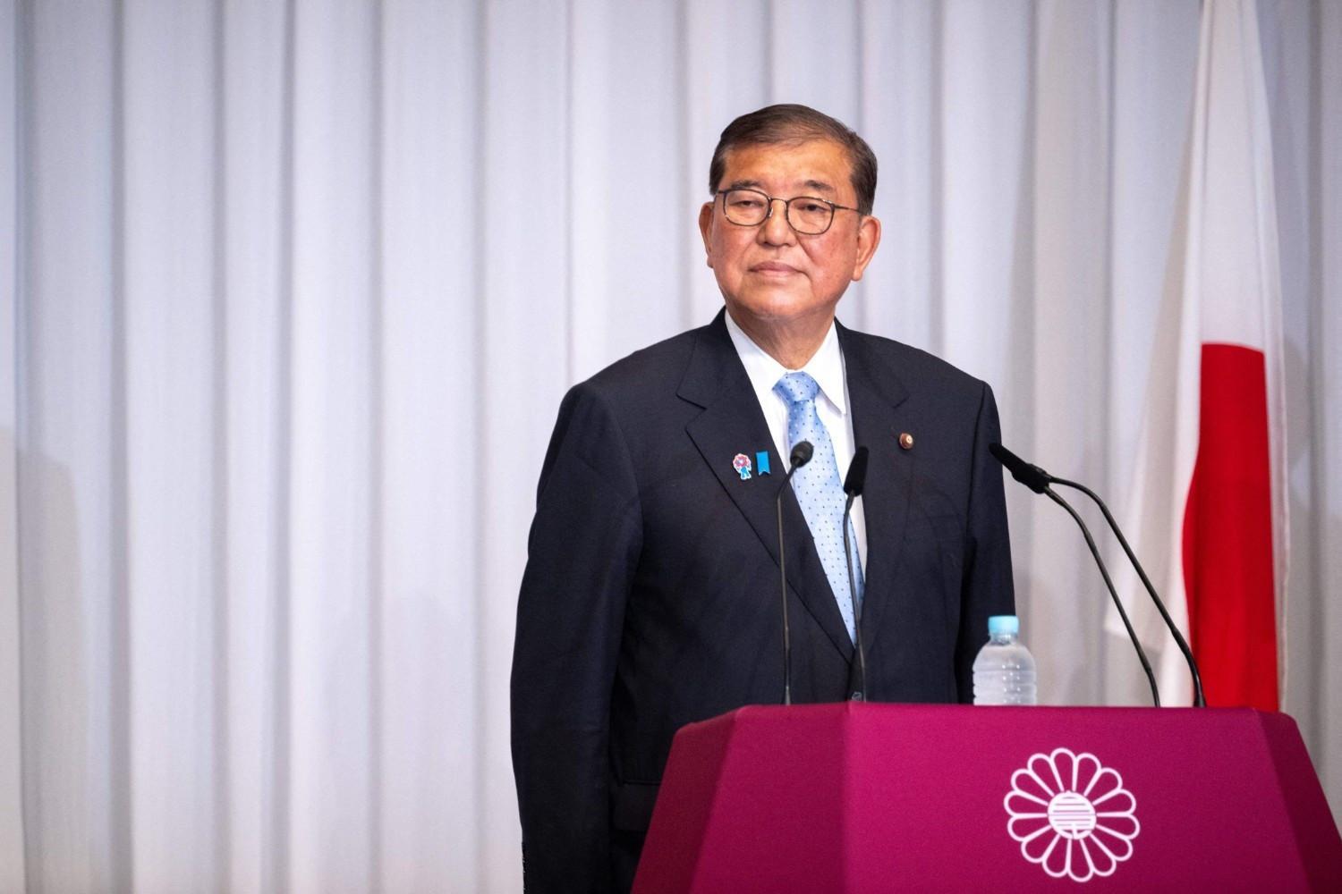 Japanese PM hangs on after extremely regrettable election