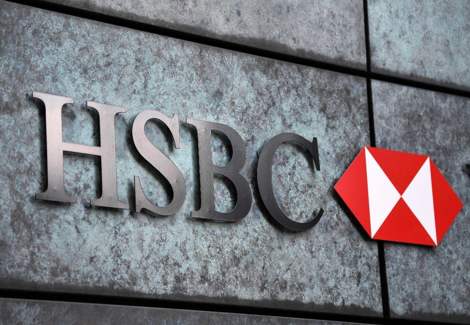 HSBC says pre-tax net income drops to $15.8 bln in first half