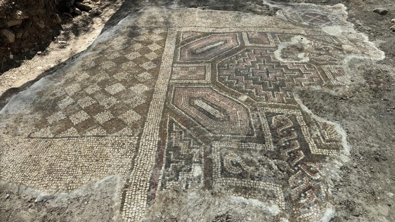 Mosaic with Star of David and Greek inscription found in grave