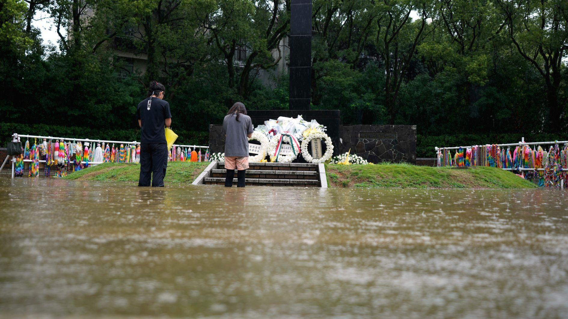 Japan urges evacuations after rains leave several missing