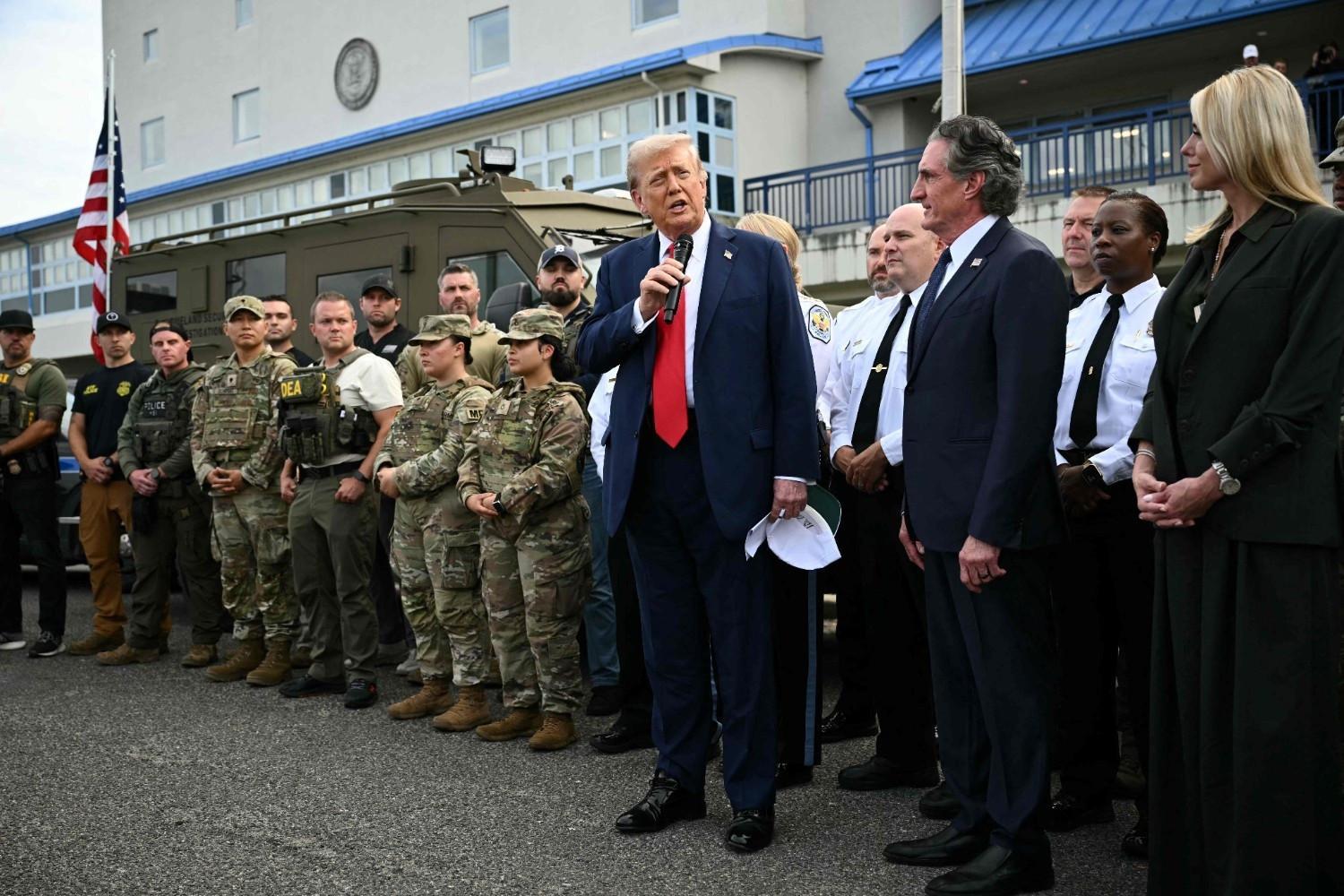 Trump visits police, troops deployed in US capital