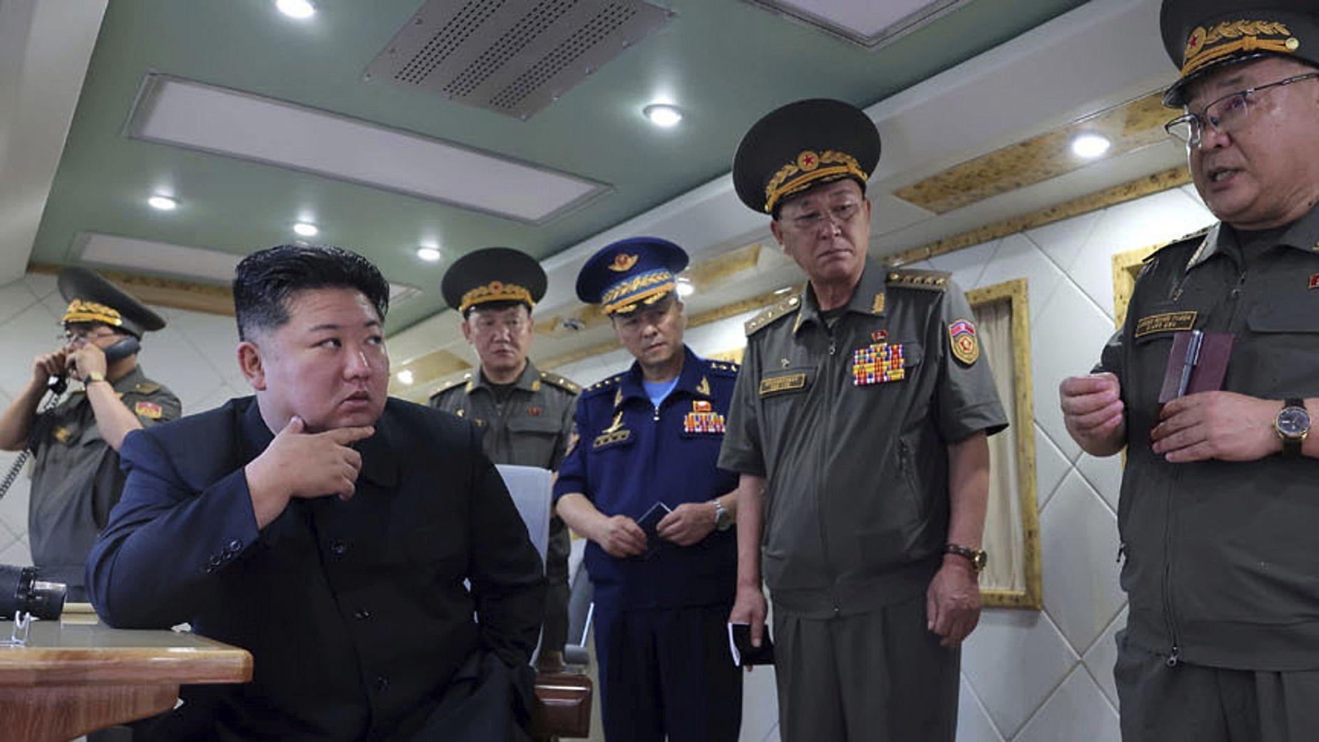 North Korea test-fires two new air defense missiles