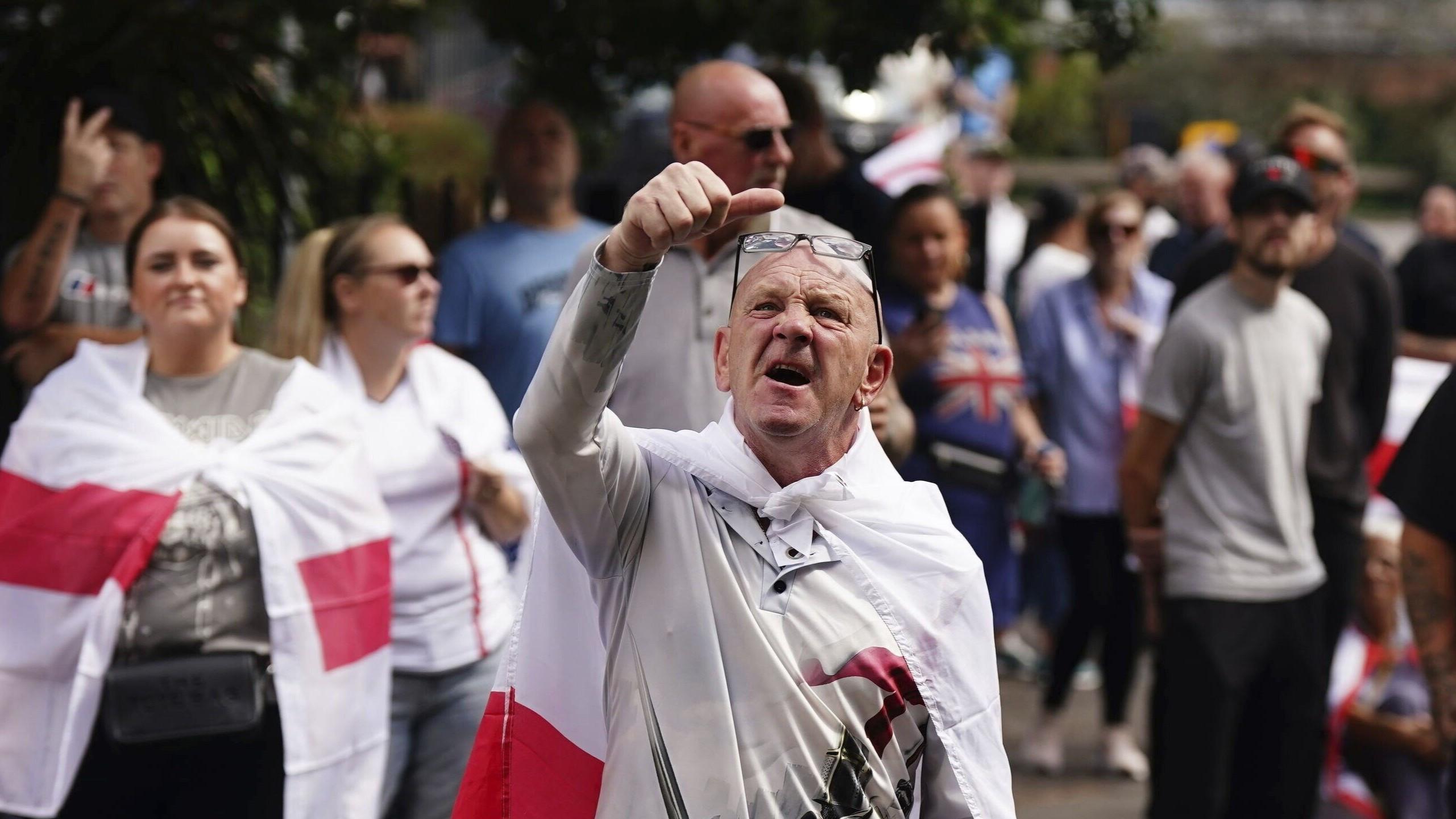 UK vows to speed up asylum claims as hotel protests spread