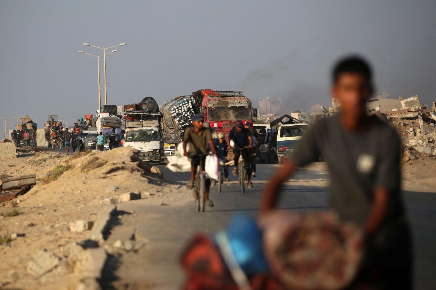 Israel flattens Gaza City high-rise as it tells residents to flee
