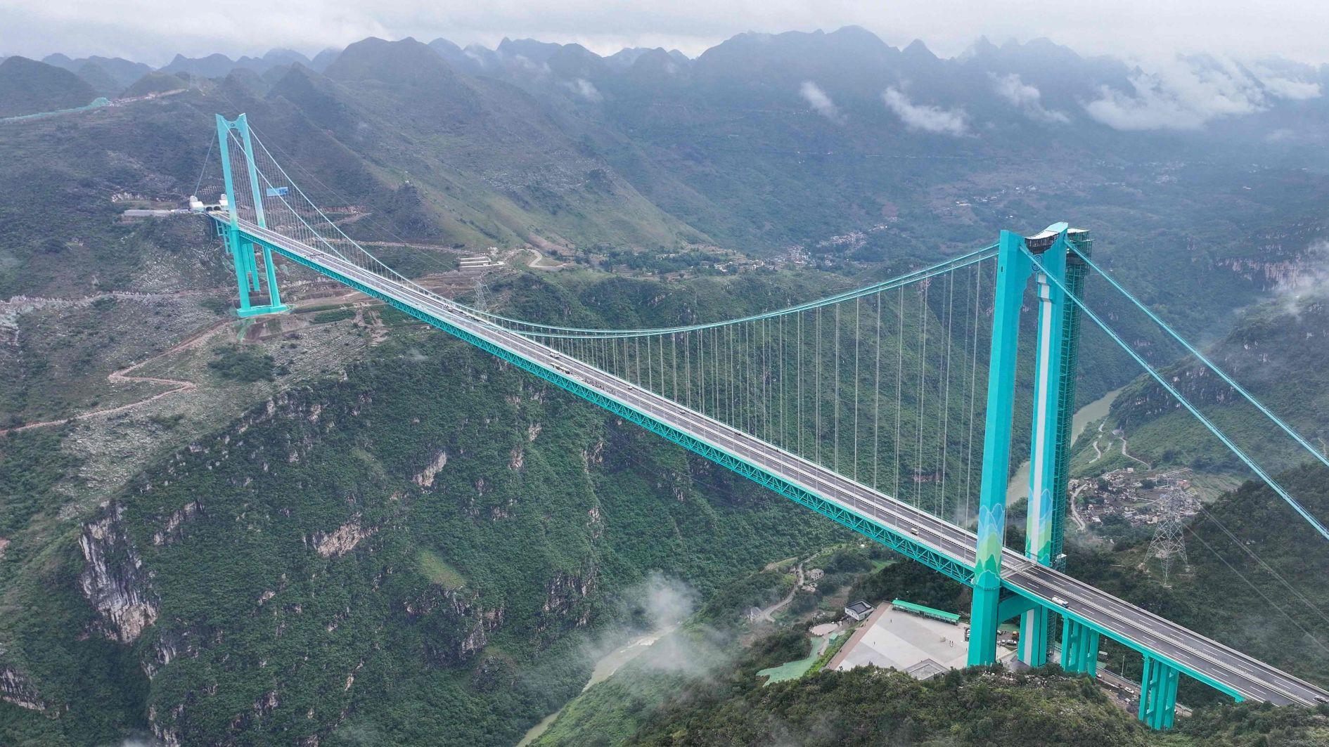 Worlds highest bridge opens to traffic in China