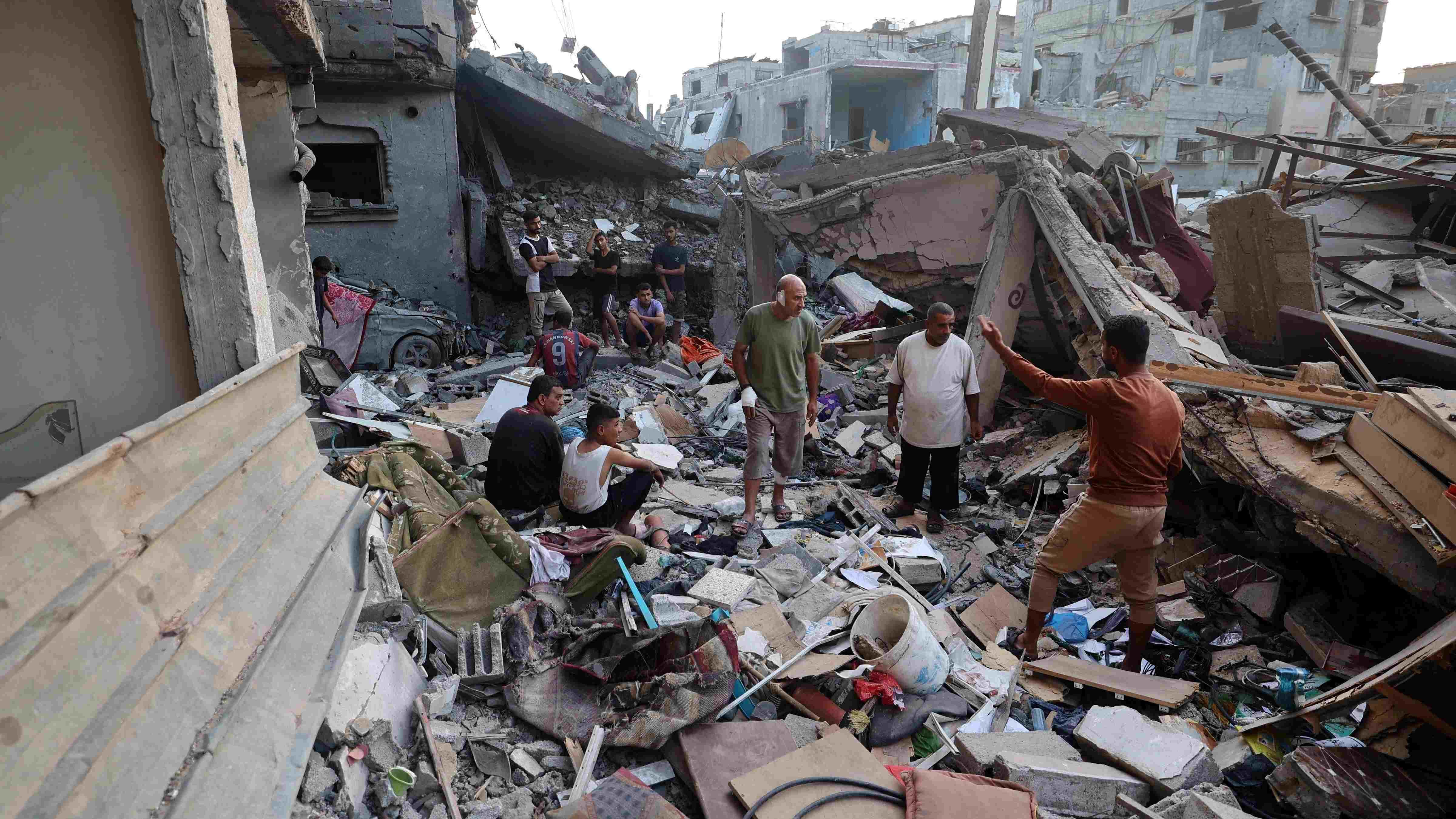 Hamas urges Israel to halt strikes as it searchs for two hostages