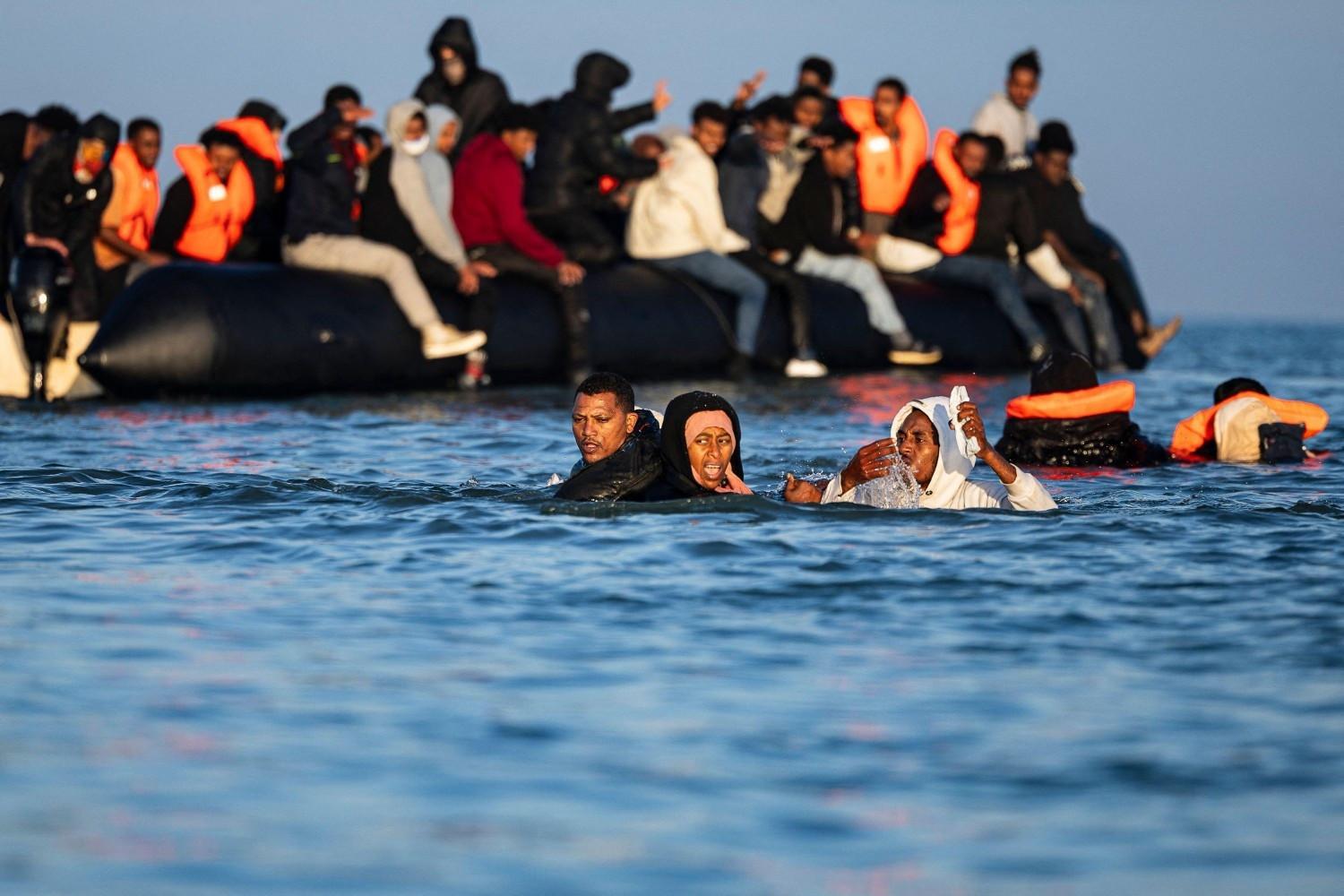 French officials: Almost 400 UK-bound migrants rescued