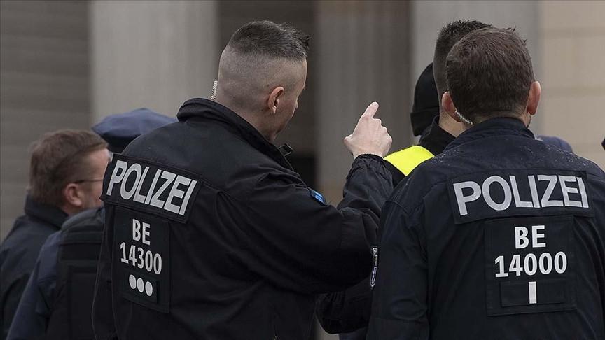 German police mobilize as blasts heard in burning house