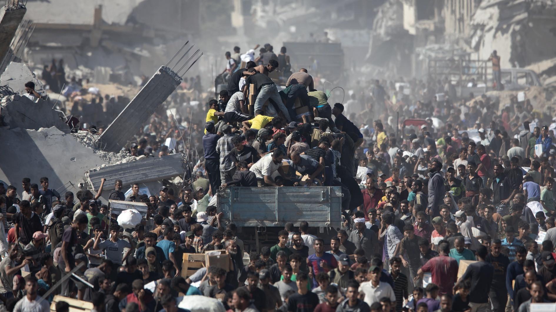 Aid trucks cross into Gaza