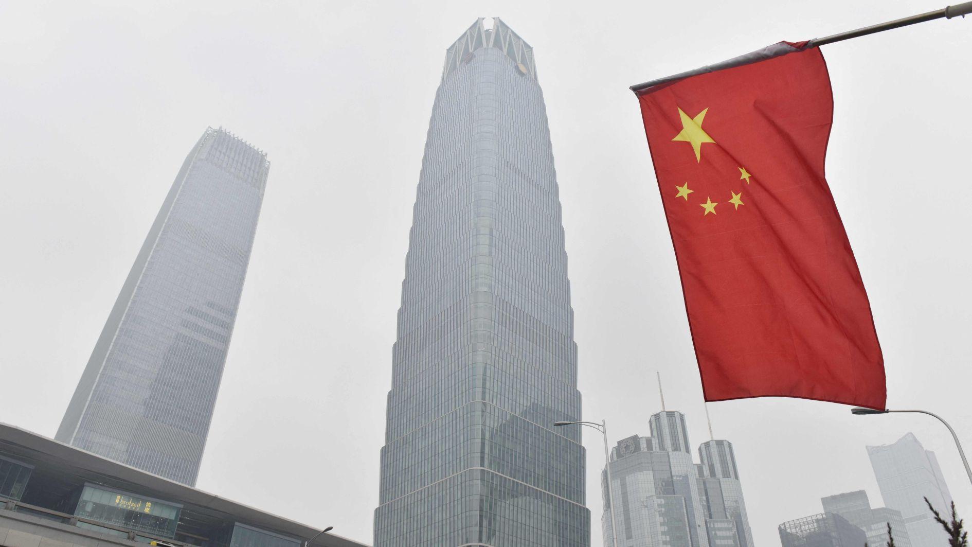 China urges equal dialogue with US as Apples Cook visits