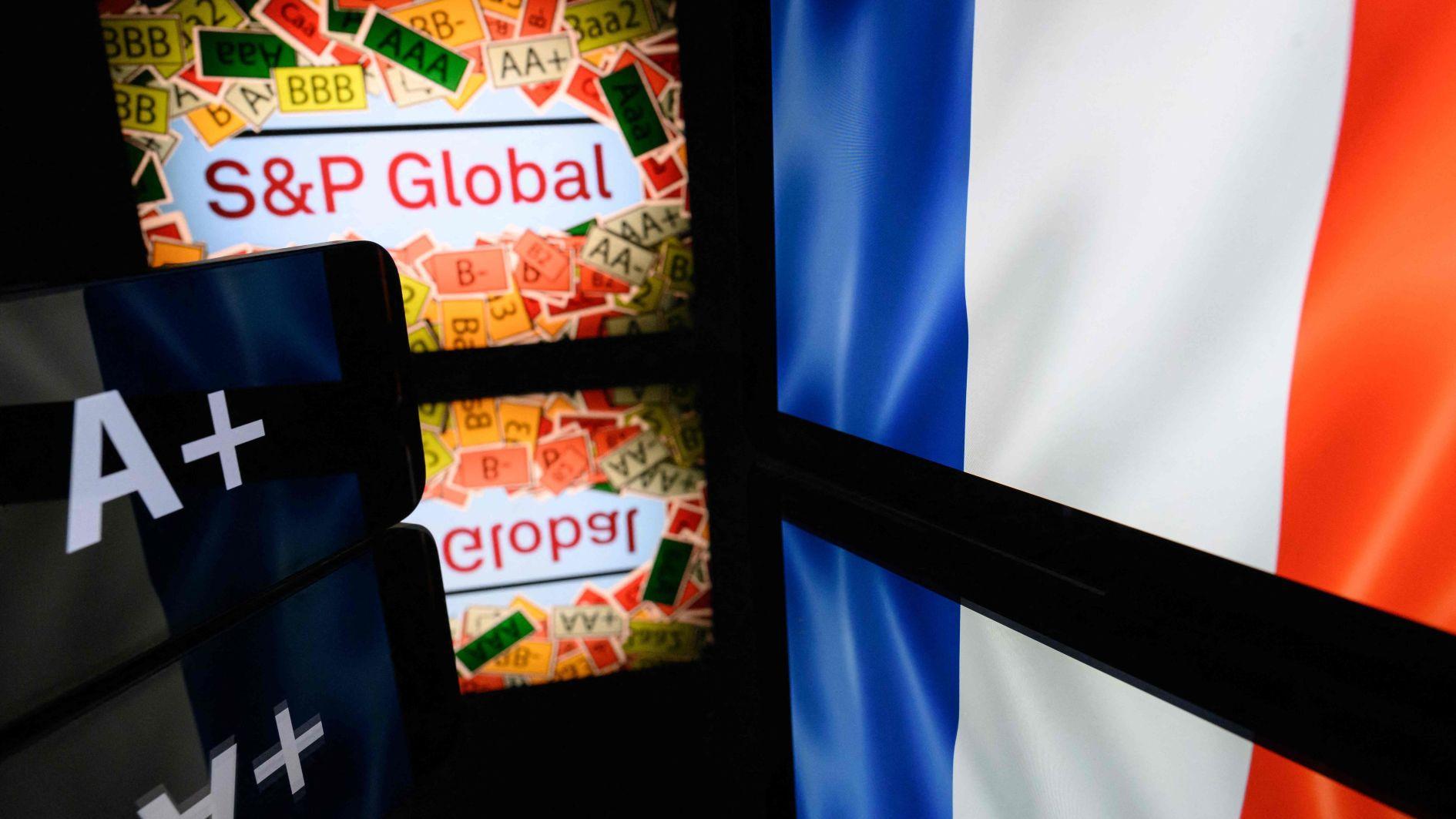 Credit downgrade underscores budget push: French minister