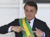Brazils Bolsonaro begins 27-year jail term for coup bid