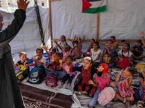 Gazas children return to makeshift classrooms