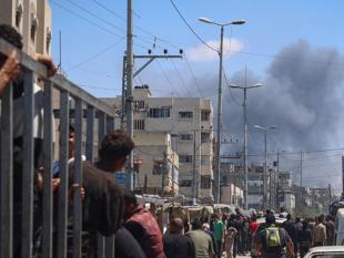 Israel shells Rafah as Biden vows arms suspension