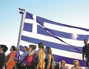 Greeks return to ballots to decide eurozone’s fate