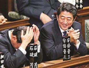 Economic data, opinion polls back new PM Abe