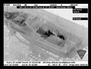 Boston bombing suspect wrote message in boat: report
