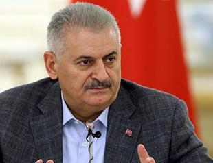Turkish PM suggests three-step road map for Syria