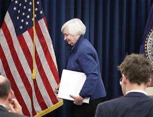 Fed raises rates as job gains, firming inflation stoke confidence