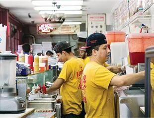 US job growth accelerates in June, but wages continue to lag